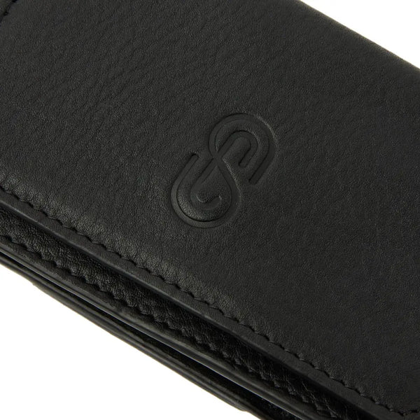 Leather insulin pump holder with sleek design and secure magnetic closure.