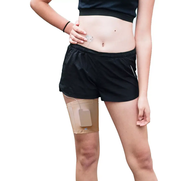 Insulin pump leg band worn by a person, showcasing a discreet and comfortable fit.
