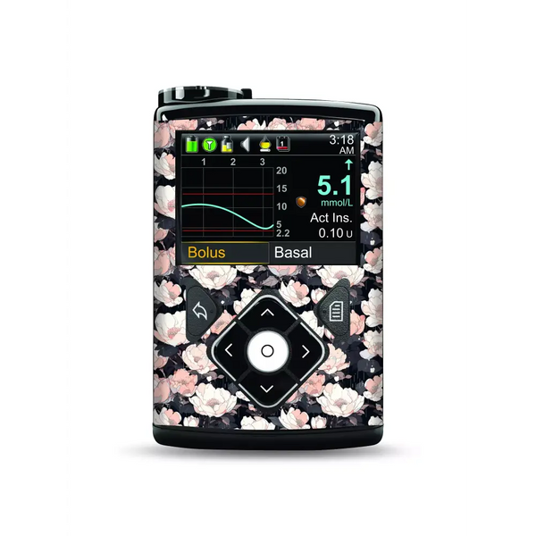 Medtronic MiniMed insulin pump with floral pattern sticker, durable and stylish.