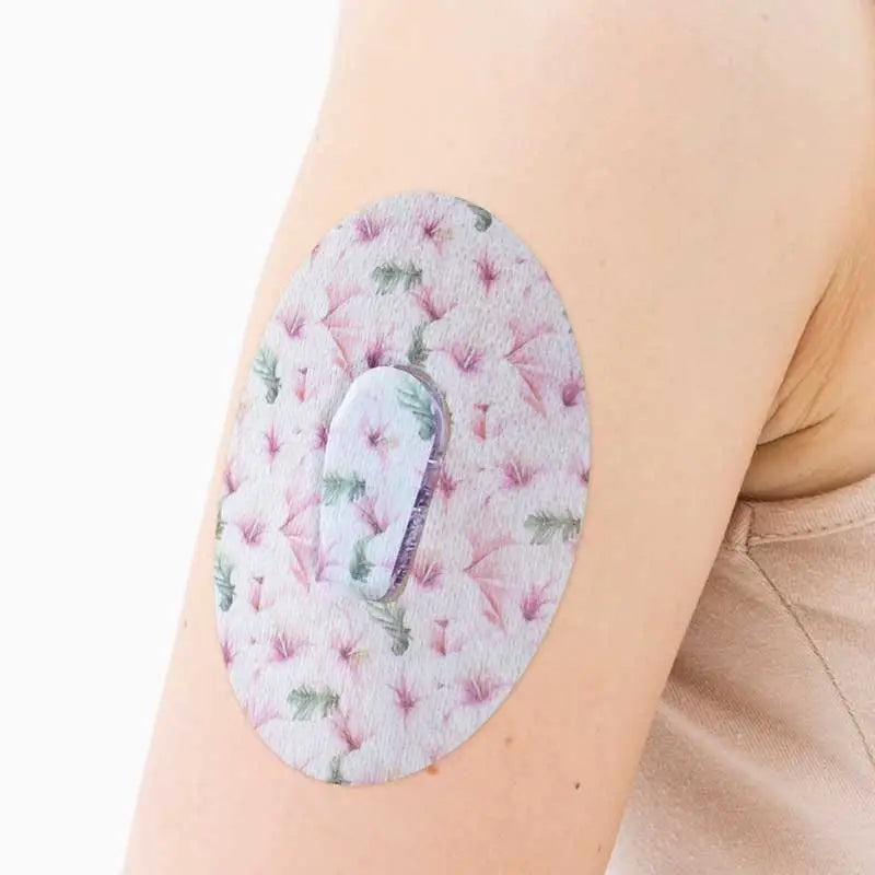dexcom G6 sensor cgm patch with sticker on the arm Obraz