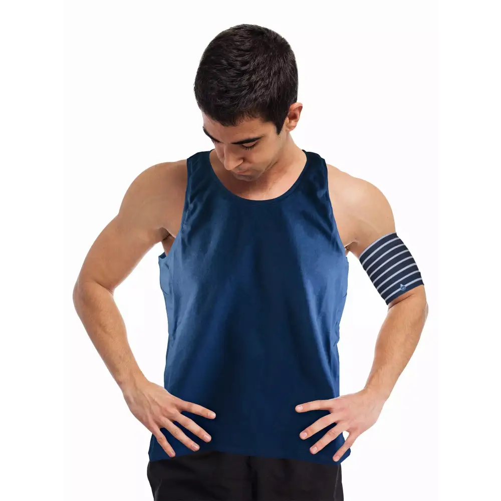 Young man wearing a navy insulin pump tank top Obraz