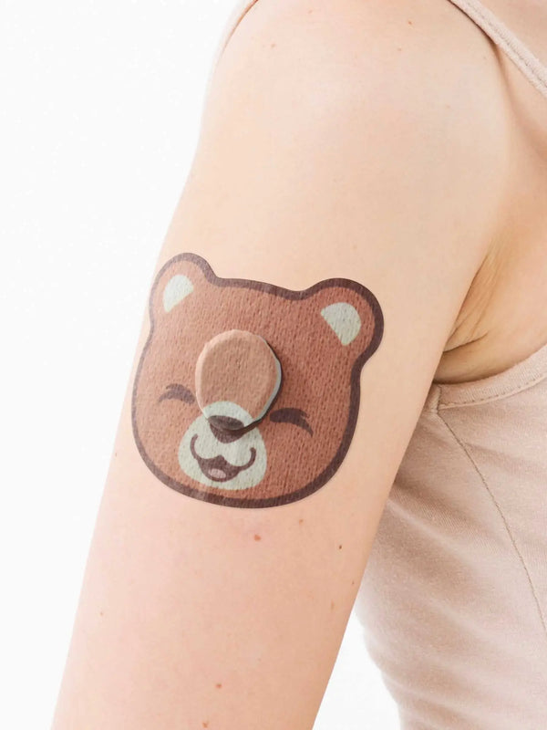 Dexcom G7 bear patch worn on arm kids adhesive CGM patch for active children needing secure sensor protection