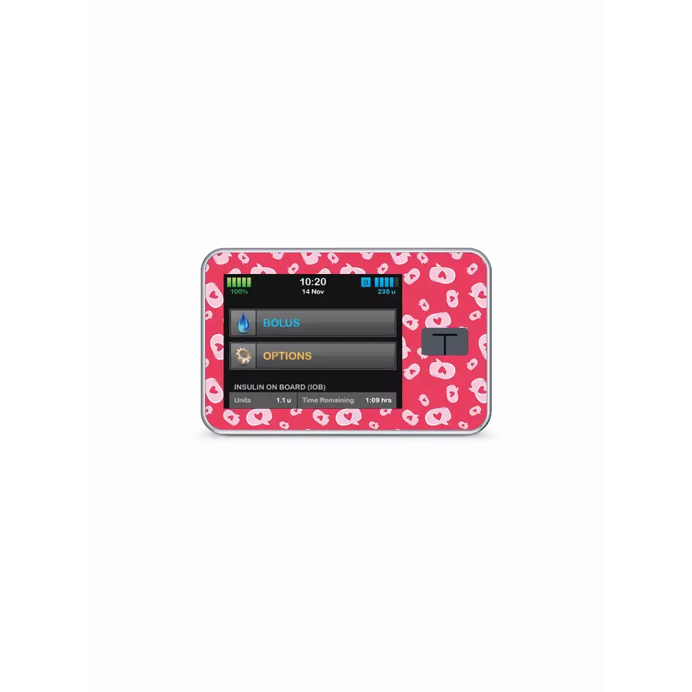 Tandem t:slim insulin pump with Valentine's Day themed pink heart patterned waterproof sticker