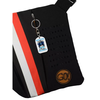 Medical Awareness Keychain - Surviving On Insulin design attached to a black and red bag.