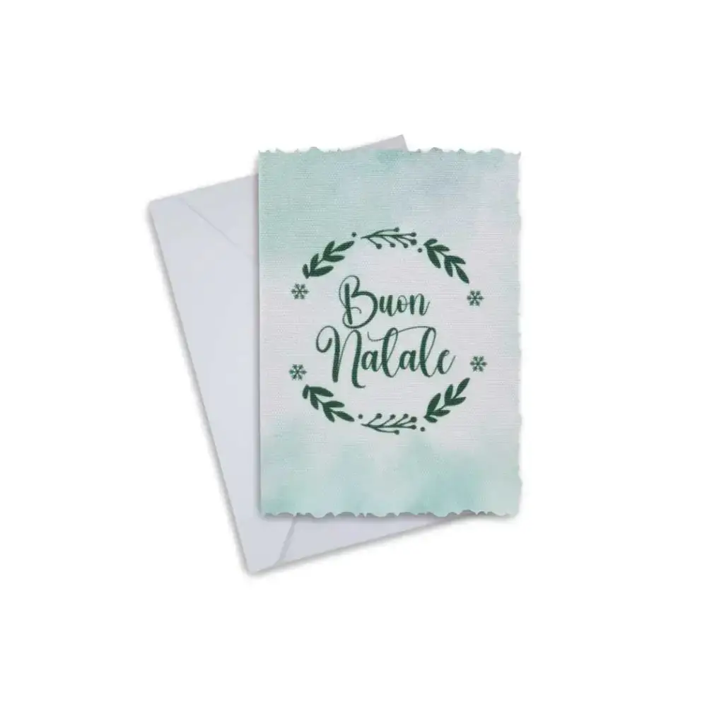 Elegant Christmas greeting card with "Buon Natale" inscription, featuring a festive wreath design, accompanied by an envelope.