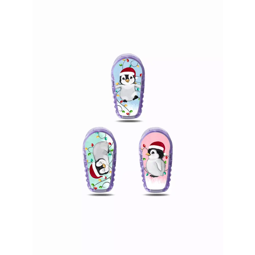 Cartoon penguin characters on colorful winter-themed Dexcom G6 Stickers for Christmas 2024