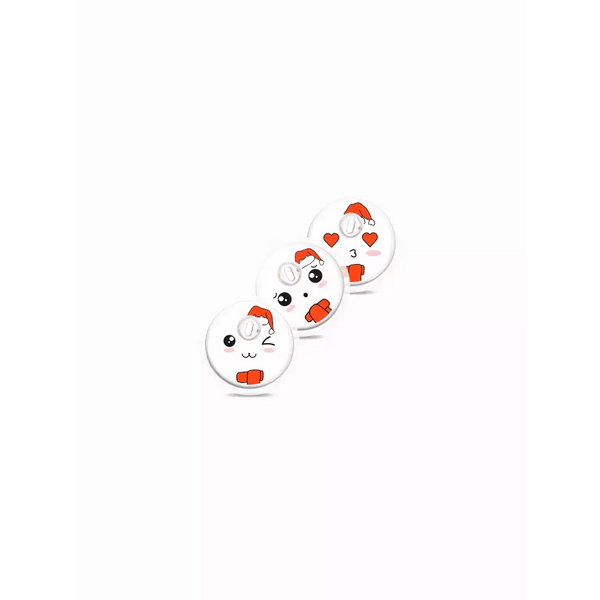 Cute cartoon cat faces in Santa hats on Freestyle Libre Christmas-themed stickers