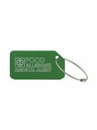 Green medical luggage tag with the text 'Food Allergies Medical Alert' engraved.