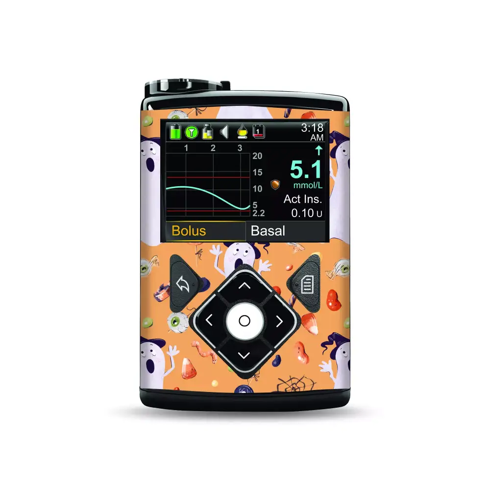 Medtronic MiniMed Insulin Pump with Halloween-themed stickers featuring ghosts and pumpkins.