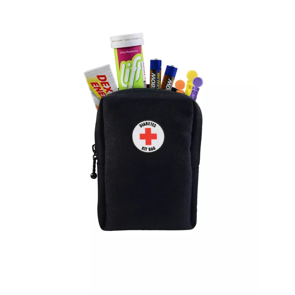Mini kit bag for diabetics with supplies, black with red cross emblem.