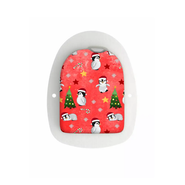 Festive red Omnipod Pod Stickers featuring penguin and Christmas tree pattern