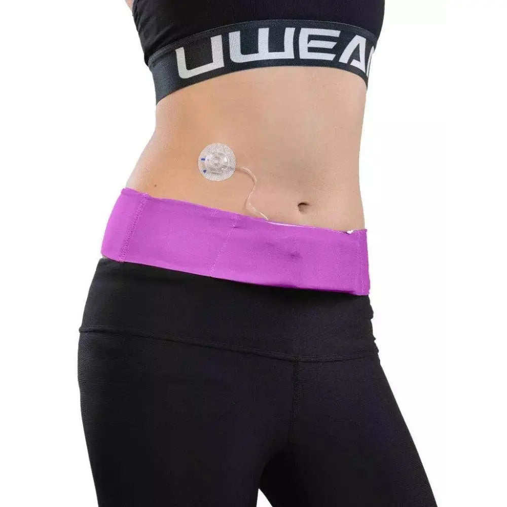 Insulin pump waist belt in solid purple color, worn discreetly around waist, suitable for active lifestyle.
