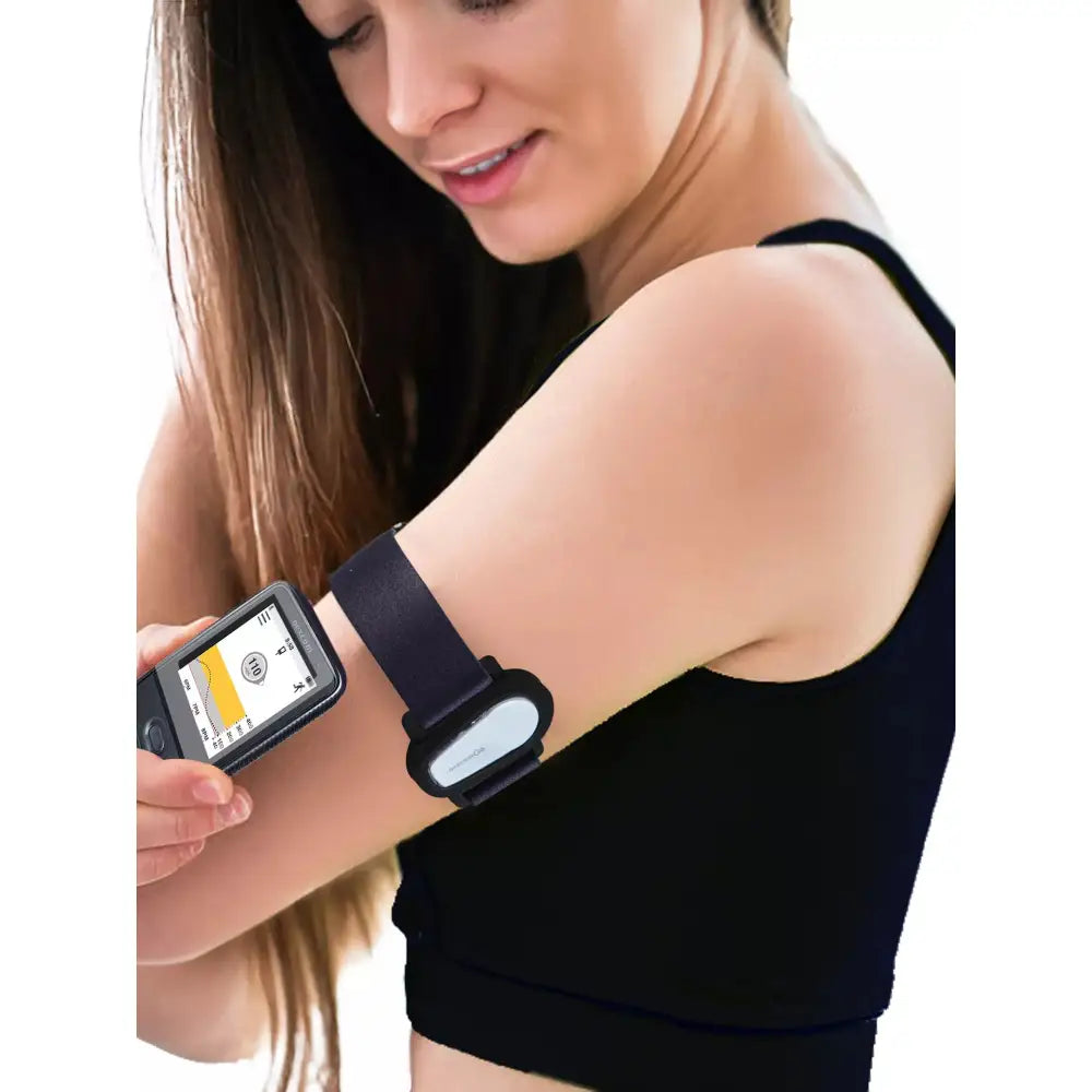 Woman wearing a Dexcom G6 Sensor adjustable armband with customizable stickers.