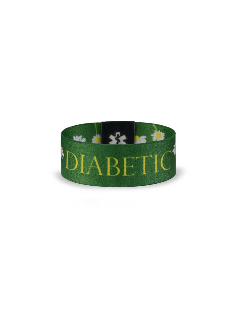 Reversible green diabetes awareness wristband with "Diabetic" and daisy print.