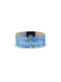 Reversible diabetes awareness wristband in vibrant summer colors displaying "Diabetic" text.