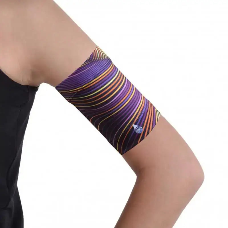 Colorful CGM arm band for glucose sensors and insulin pumps on a person's upper arm.